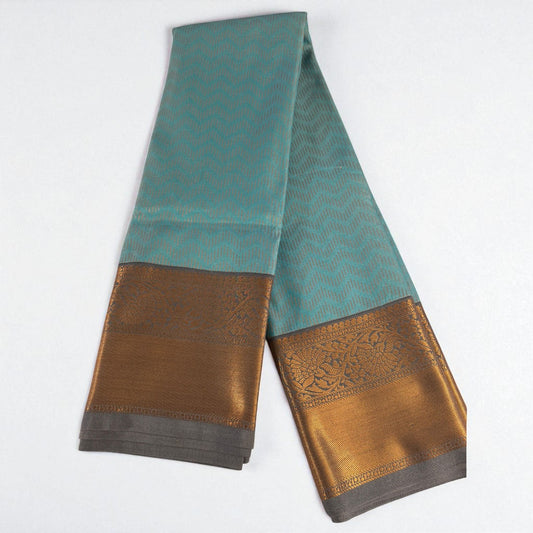 Art Silk Zari Woven Saree – Teal Blue with Copper-Gold Border